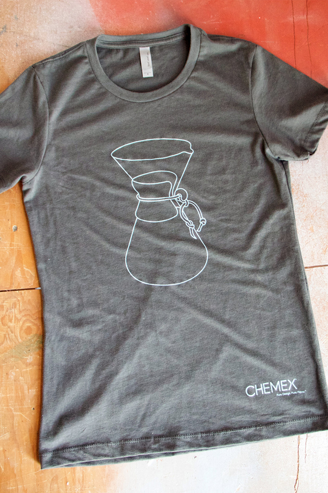 Chemex t-shirt with a outline of a coffeemaker laying on a table