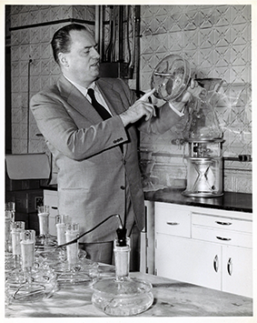 Dr. Peter Schlumbohm in the Chemex Corporation laboratory, ~1961