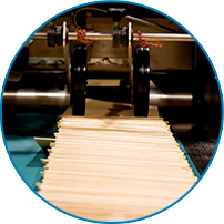 Chemex filter-cutting machine producing compostable filter papers in the Massachusetts factory, 2026